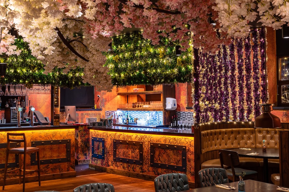 Floral interior Kerala canteen leeds