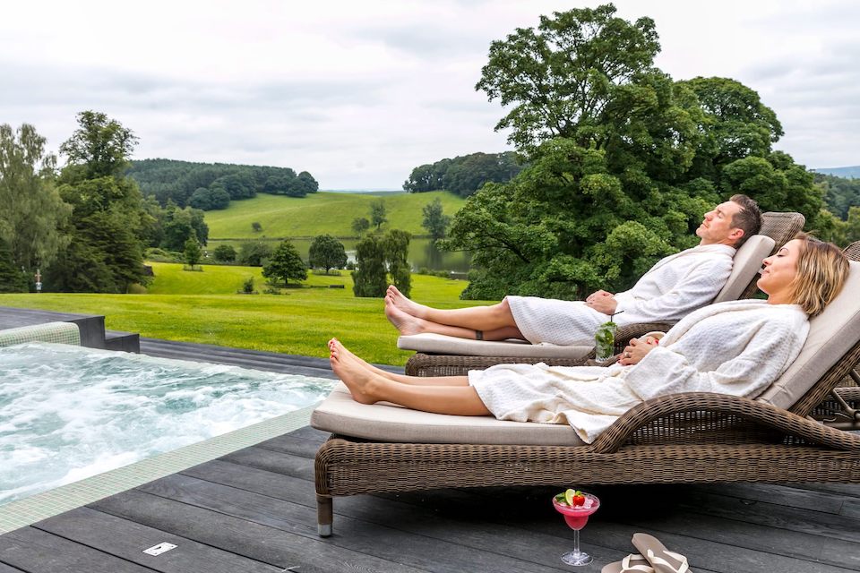 Coniston Spa offer - couple relaxing by the pool Fathers Day Gift Guide