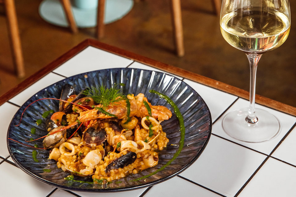 Domo Sheffield Seafood Risotto and Glass of Wine Food - romantic restaurants in Yorkshire