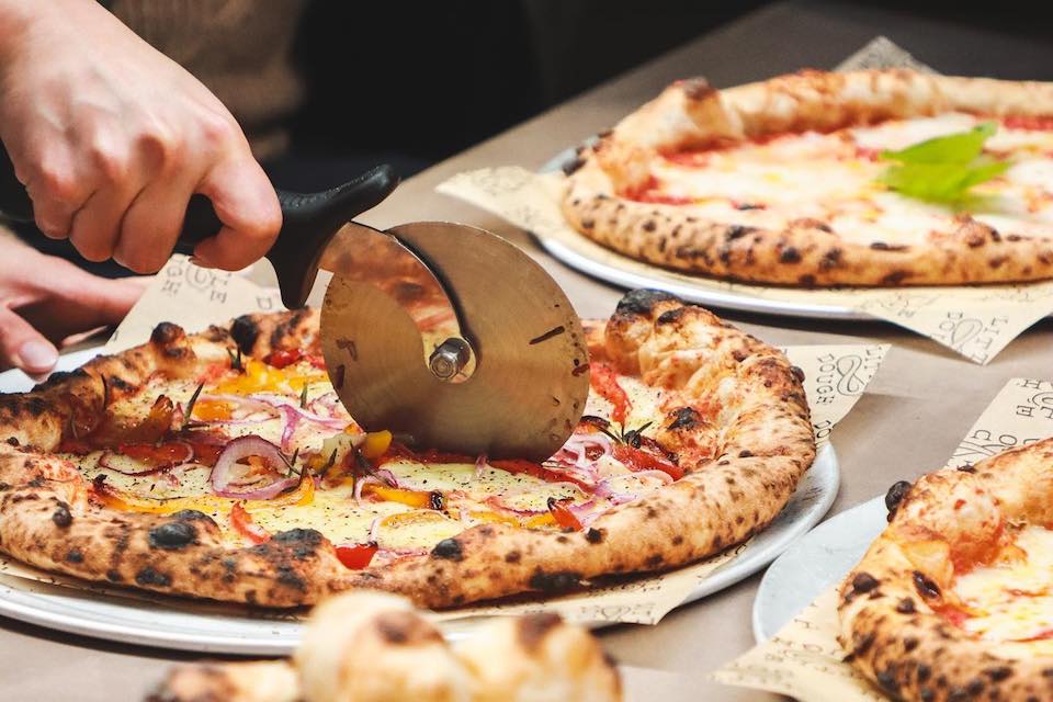 Cutlery Works slicing pizza - vegan restaurants in Sheffield