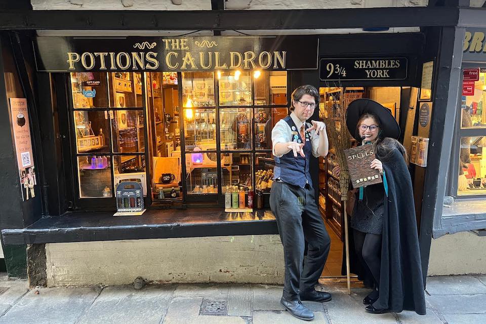 Potions Cauldron exterior shot with staff
