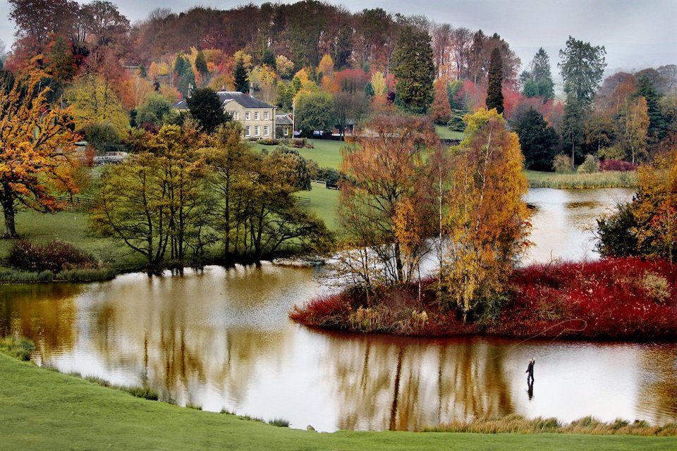 dog-friendly yorkshire hotel coniston set in its grounds behind a lake in the autumn 